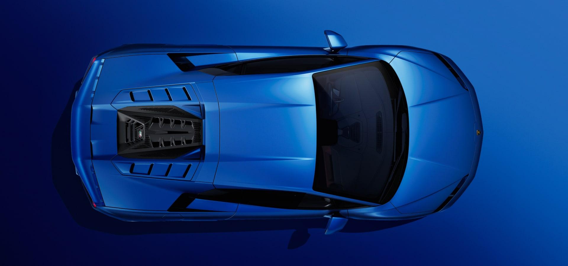Lamborghini Temerario in Blu Marinus, highlighting the aerodynamic roofline and the visible V8 twin-turbo hybrid engine cover